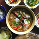 Image for article titled Carne en su jugo is the Mexican soup that has it all (steak, bacon, beans, avocados, chiles...)